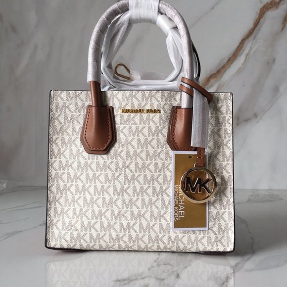 Michael Kors Handbags - 💎 Michael Kors Metal Logo Totes Silver tone hardware 💎